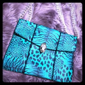 *Brand New*
Turquoise Snake Charmer bag